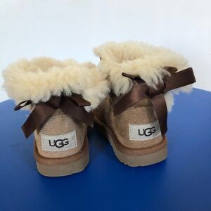 UGG Tan Shearling Boots with Brown Ribbon